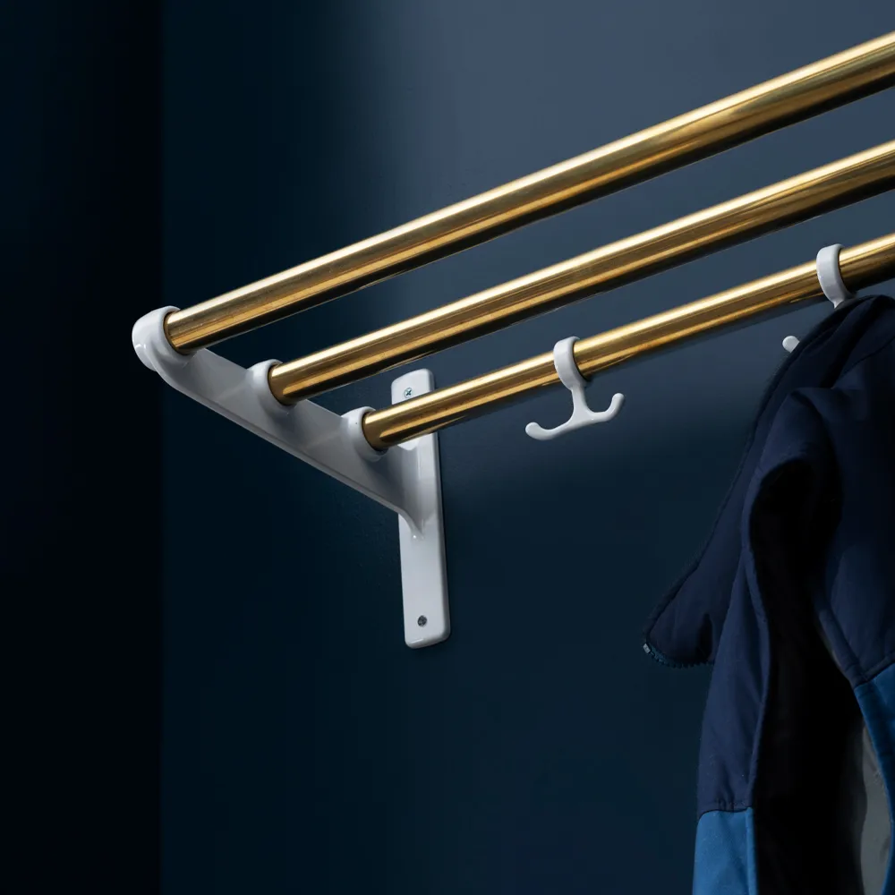 Nostalgi Shoe or hat shelf, Brass, black stand Essem Design