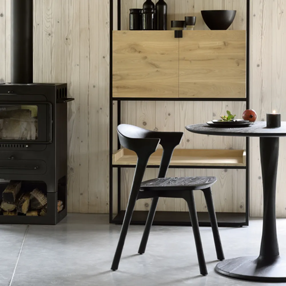 Torsion dining table, Black-stained oak, Ø127 cm Ethnicraft