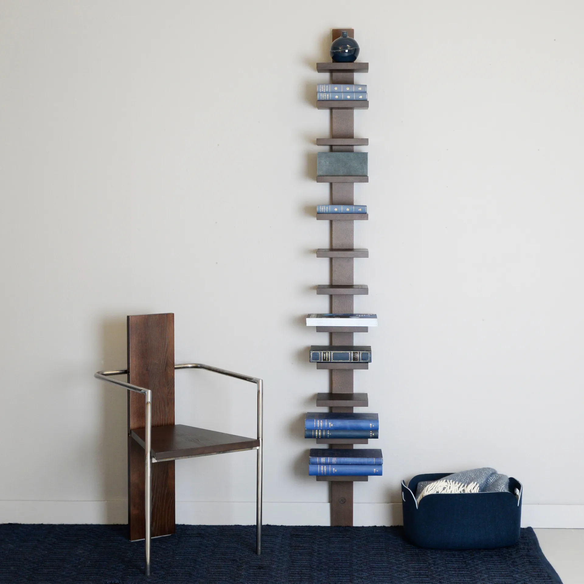 Concrete armchair, Walnut-stained ash - untreated steel base Källemo