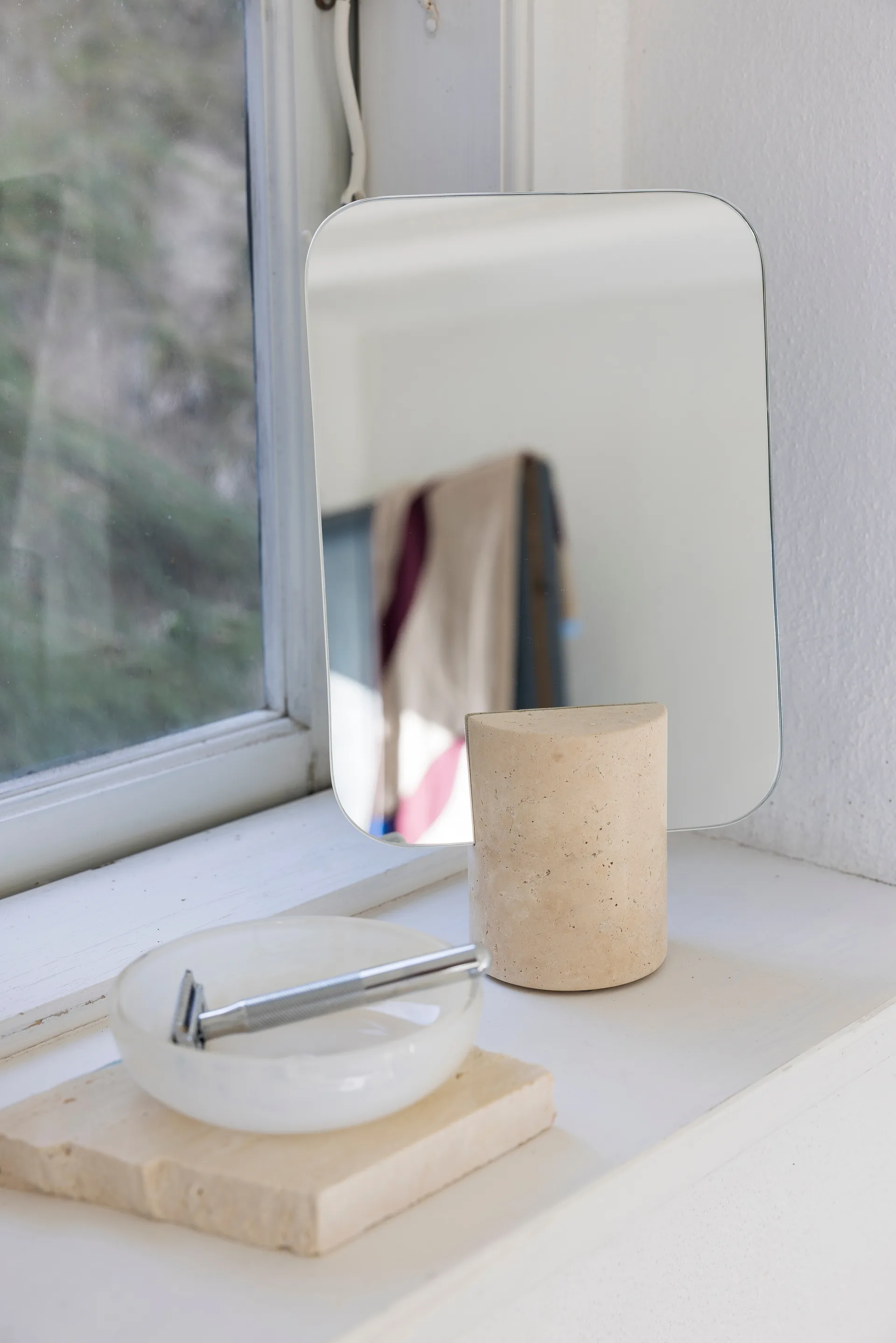 Travertine vanity mirror, Linen Mette Ditmer