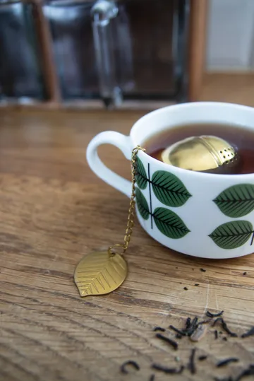 Stig L Berså tea infuser - Gold - Pluto Design