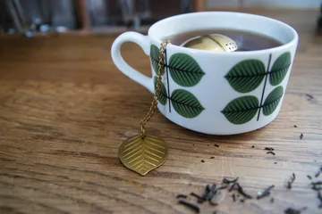 Stig L Berså tea infuser - Gold - Pluto Design